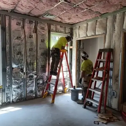 Professional drywall contractor working on commercial construction project